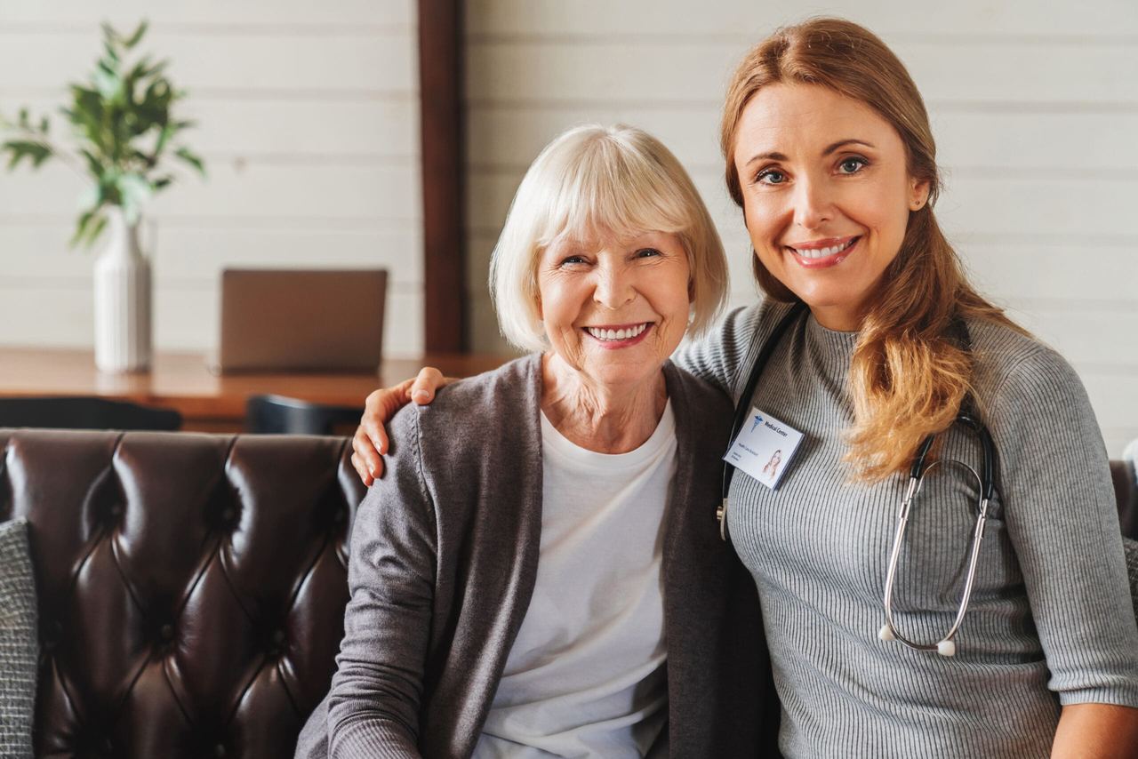 A Metro Geriatrics nurse with a resident